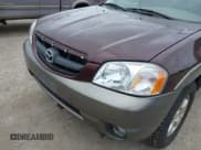 ✅ 2001 Mazda Tribute LX • VIN: 4F2CU08141KM10269 • Лот: 42138704. Опубликован ранее на IAAI с пробегом 166 825 миль. Бесплатный доступ к архиву аукционных продаж из США и подробный отчёт об истории автомобиля на DreamBid. Изображение 6.