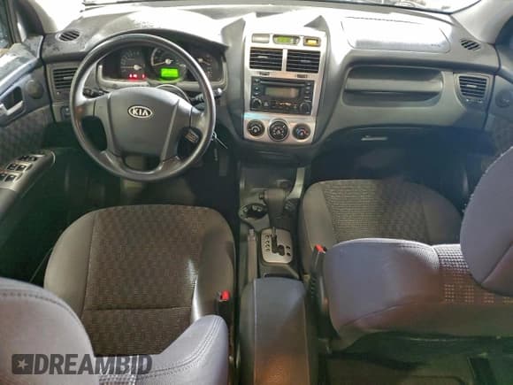 ✅ 2007 Kia Sportage LX • VIN: KNDJE723977447370 • Lot: 93623945. Wystawiony na Copart z przebiegiem 183 828 mil. Bezpłatny archiwum sprzedaży aukcyjnych z USA i szczegółowy raport historii pojazdu na DreamBid. Zdjęcie 8.