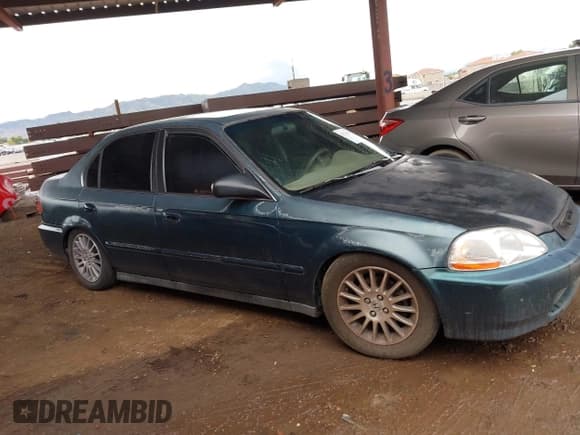 ✅ 1998 Honda Civic EX • VIN: 2HGEJ8548WH591052 • Lot: 43714933. Listed on IAAI with 195,077 mi. Free auction sales archive from the USA and detailed vehicle history report at DreamBid. Image 13.