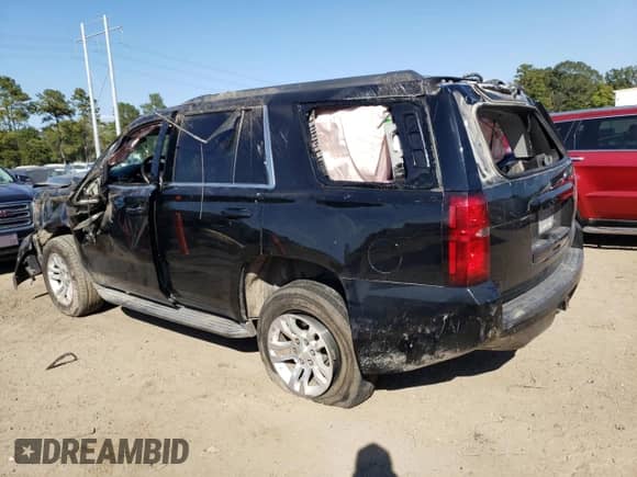 2015 Chevrolet Tahoe LS с VIN 1GNSCAEC7FR289043, выставлен на аукционе Copart как лот 85112035 с пробегом 144 085 миль миль и Списание • Salvage title. История ставок и продаж доступна на DreamBid. Изображение 2.