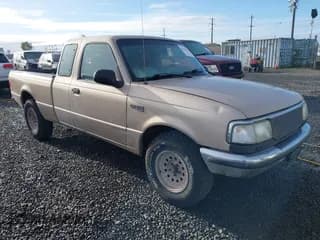 ✅ 1997 Ford Ranger XL • VIN: 1FTCR14A0VTA01912 • Lot: 43518470. Wystawiony na IAAI z przebiegiem 202 873 mil. Bezpłatny archiwum sprzedaży aukcyjnych z USA i szczegółowy raport historii pojazdu na DreamBid. Zdjęcie 1.