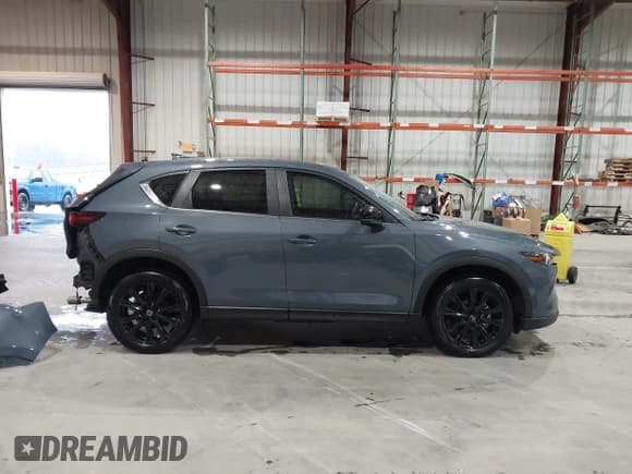 ✅ 2024 Mazda CX-5 S Carbon Edition • VIN: JM3KFBCL7R0454324 • Lot: 43545247. Listed on IAAI with 13,799 mi. Free auction sales archive from the USA and detailed vehicle history report at DreamBid. Image 14.