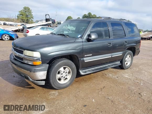 ✅ 2003 Chevrolet Tahoe LS • VIN: 1GNEC13Z13R155130 • Lot: 43812057. Listed on IAAI with 233,340 mi. Free auction sales archive from the USA and detailed vehicle history report at DreamBid. Image 2.