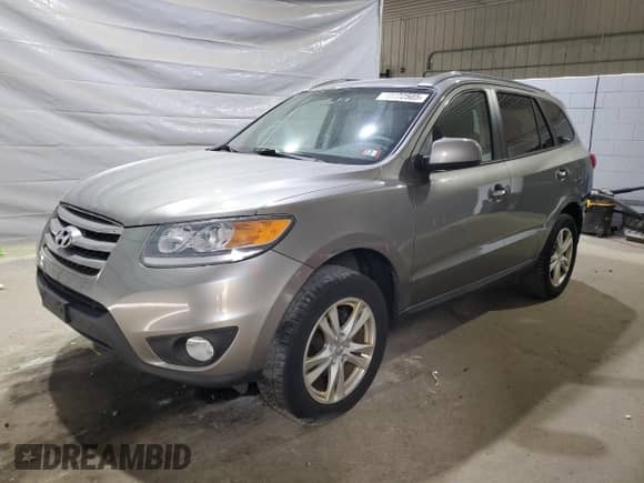 2012 Hyundai Santa Fe Limited с VIN 5XYZKDAG5CG144226, выставлен на аукционе Copart как лот 70772505 с пробегом 176 332 миль миль и Списание • Salvage title. История ставок и продаж доступна на DreamBid. Изображение 1.