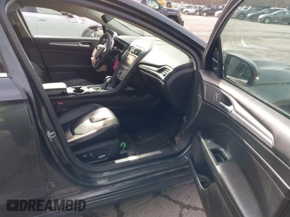 ✅ 2016 Ford Fusion Titanium • VIN: 3FA6P0K92GR135594 • Lot: 43749043. Listed on IAAI with 195,125 mi. Free auction sales archive from the USA and detailed vehicle history report at DreamBid. Image 5.