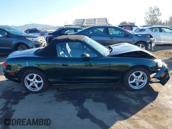 ✅ 2001 Mazda MX-5 Miata • VIN: JM1NB353710205398 • Lot: 41356329. Listed on IAAI with 126,680 mi. Free auction sales archive from the USA and detailed vehicle history report at DreamBid. Image 13.