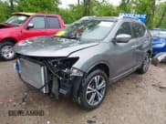 ✅ 2017 Nissan Rogue SL • VIN: 5N1AT2MT9HC747002 • Lot: 42284884. Listed on IAAI with 107,061 mi. Free auction sales archive from the USA and detailed vehicle history report at DreamBid. Image 2.