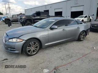 ✅ 2014 Jaguar XJ Portfolio • VIN: SAJWA2GZXE8V65955 • Lot: 70107335. Listed on Copart with 95,076 mi. Free auction sales archive from the USA and detailed vehicle history report at DreamBid. Image 1.