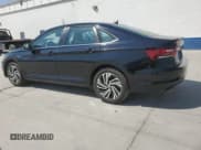 ✅ 2021 Volkswagen Jetta SEL • VIN: 3VWE57BU5MM013374 • Лот: 65150905. Опубликован ранее на Copart с пробегом 50 969 миль. Бесплатный доступ к архиву аукционных продаж из США и подробный отчёт об истории автомобиля на DreamBid. Изображение 2.