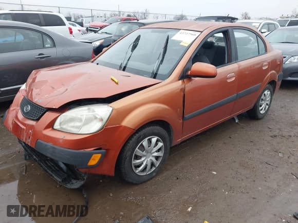 ✅ 2009 Kia Rio LX • VIN: KNADE223596580617 • Lot: 43727560. Wystawiony na IAAI z przebiegiem 243 386 mil. Bezpłatny archiwum sprzedaży aukcyjnych z USA i szczegółowy raport historii pojazdu na DreamBid. Zdjęcie 2.