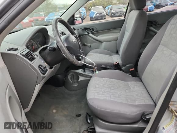 ✅ 2005 Ford Focus S • VIN: 1FAFP34N65W140576 • Lot: 86826535. Listed on Copart with 170,497 mi. Free auction sales archive from the USA and detailed vehicle history report at DreamBid. Image 7.