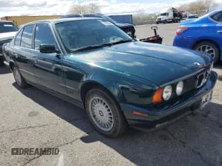✅ 1993 BMW 5 Series • VIN: WBAHD6316PBJ92437 • Lot: 47665945. Listed on Copart with 191,001 mi. Free auction sales archive from the USA and detailed vehicle history report at DreamBid. Image 4.