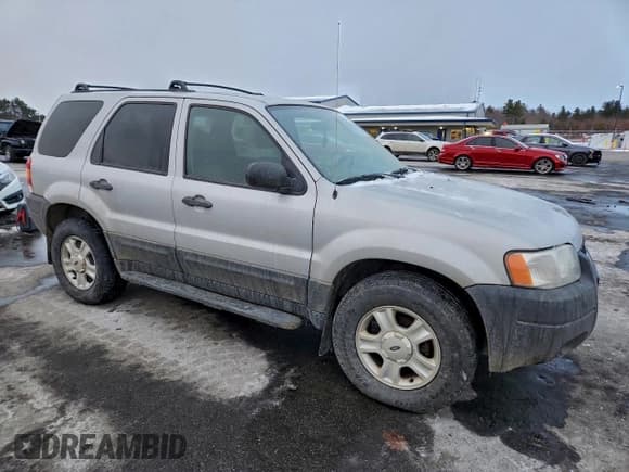 ✅ 2003 Ford Escape XLT Popular 2 • VIN: 1FMYU93133KB85553 • Lot: 95891575. Listed on Copart with 130,488 mi. Free auction sales archive from the USA and detailed vehicle history report at DreamBid. Image 4.
