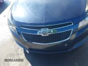 ✅ 2014 Chevrolet Cruze LS • VIN: 1G1PA5SH3E7461213 • Lot: 43617659. Wystawiony na IAAI z przebiegiem 137 810 mil. Bezpłatny archiwum sprzedaży aukcyjnych z USA i szczegółowy raport historii pojazdu na DreamBid. Zdjęcie 6.