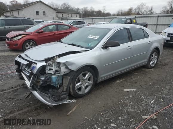✅ 2011 Chevrolet Malibu 1LS • VIN: 1G1ZB5E12BF234469 • Lot: 80911784. Listed on Copart with 228,949 mi. Free auction sales archive from the USA and detailed vehicle history report at DreamBid. Image 1.