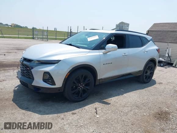 2020 Chevrolet Blazer RS z VIN 3GNKBERS0LS670737, wystawiony jako IAAI lot #42484504 z przebiegiem 64 065 mil mil oraz . Historia ofert i sprzedaży dostępna na DreamBid. Obrazek 2.