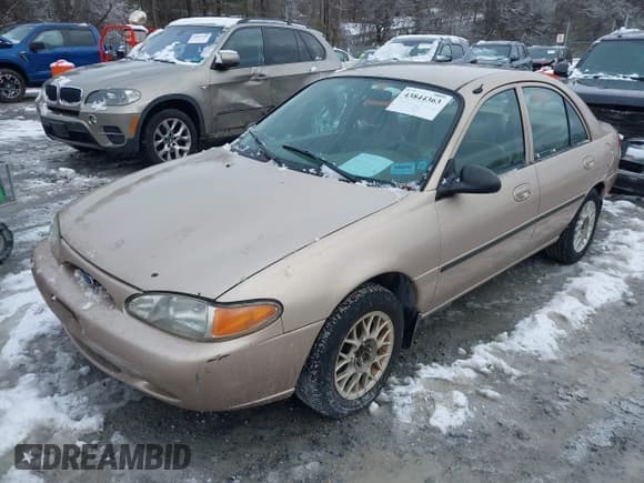 ✅ 1998 Ford Escort LX • VIN: 1FAFP10P4WW212534 • Лот: 43844363. Опубликован ранее на IAAI с пробегом 133 006 миль. Бесплатный доступ к архиву аукционных продаж из США и подробный отчёт об истории автомобиля на DreamBid. Изображение 2.