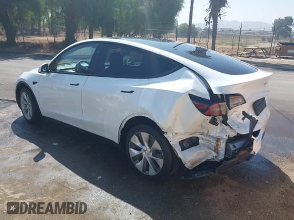 ✅ 2023 Tesla Model Y Long Range • VIN: 7SAYGDEE3PF897016 • Lot: 40407572. Listed on IAAI with 8,030 mi. Free auction sales archive from the USA and detailed vehicle history report at DreamBid. Image 3.