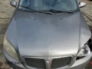 ✅ 2009 Pontiac G3 • VIN: KL2TD66E39B647536 • Lot: 76592784. Listed on Copart with 123,818 mi. Free auction sales archive from the USA and detailed vehicle history report at DreamBid. Image 12.