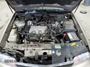 ✅ 1996 Buick Skylark • VIN: 1G4NJ52M8TC423245 • Лот: 43144835. Опубликован ранее на Copart с пробегом 75 665 миль. Бесплатный доступ к архиву аукционных продаж из США и подробный отчёт об истории автомобиля на DreamBid. Изображение 11.