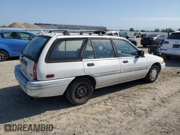 ✅ 1993 Ford Escort • VIN: 3FAPP15J0PR178136 • Lot: 55252715. Listed on Copart with 29,996 mi. Free auction sales archive from the USA and detailed vehicle history report at DreamBid. Image 3.