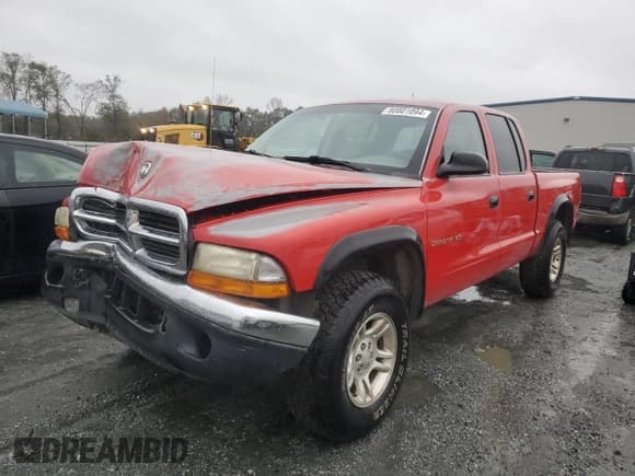 ✅ 2002 Dodge Dakota SLT • VIN: 1B7HG48N62S532124 • Lot: 80801094. Wystawiony na Copart z przebiegiem 302 342 mil. Bezpłatny archiwum sprzedaży aukcyjnych z USA i szczegółowy raport historii pojazdu na DreamBid. Zdjęcie 1.