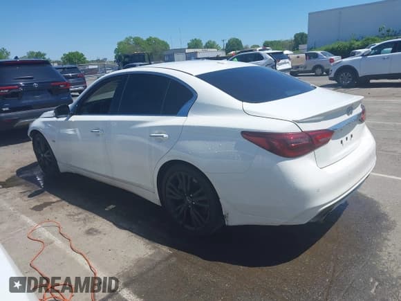 ✅ 2019 Infiniti Q50 Luxe • VIN: JN1EV7AP7KM513482 • Lot: 42000334. Listed on IAAI with 101,789 mi. Free auction sales archive from the USA and detailed vehicle history report at DreamBid. Image 14.