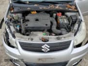 ✅ 2008 Suzuki SX4 • VIN: JS2YB413885103832 • Лот: 91810315. Опубликован ранее на Copart с пробегом 135 956 миль. Бесплатный доступ к архиву аукционных продаж из США и подробный отчёт об истории автомобиля на DreamBid. Изображение 12.