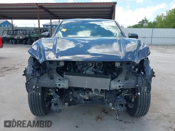 ✅ 2025 Toyota Tacoma SR • VIN: 3TYKD5HN5ST021344 • Lot: 42568643. Wystawiony na IAAI z przebiegiem 5 567 mil. Bezpłatny archiwum sprzedaży aukcyjnych z USA i szczegółowy raport historii pojazdu na DreamBid. Zdjęcie 13.