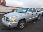 ✅ 2005 Dodge Dakota ST • VIN: 1D7HW28N65S130251 • Лот: 43622144. Опубликован ранее на IAAI с пробегом 205 489 миль. Бесплатный доступ к архиву аукционных продаж из США и подробный отчёт об истории автомобиля на DreamBid. Изображение 2.