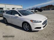 ✅ 2016 Ford Fusion Titanium Hybrid • VIN: 3FA6P0RUXGR293160 • Lot: 91189245. Listed on Copart with 91,293 mi. Free auction sales archive from the USA and detailed vehicle history report at DreamBid. Image 4.