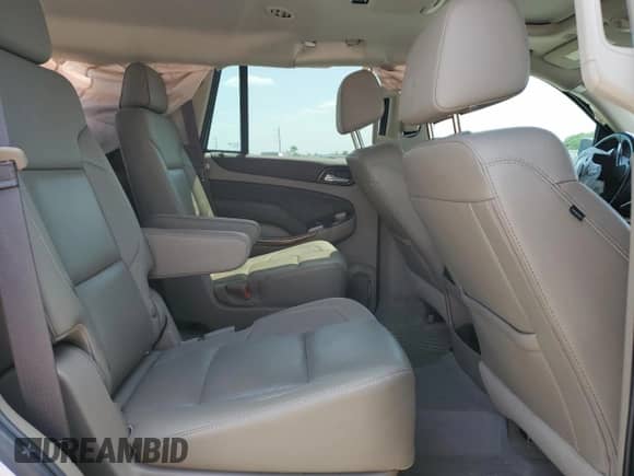 2019 Chevrolet Tahoe Premier z VIN 1GNSKCKJ3KR295868, wystawiony jako Copart lot #53320585 z przebiegiem 90 370 mil mil oraz Szkoda całkowita • Salvage title. Historia ofert i sprzedaży dostępna na DreamBid. Obrazek 11.