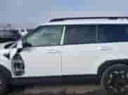 2025 Hyundai Santa Fe SEL z VIN 5NMP24GL0SH076658, wystawiony jako IAAI lot #43616886 z przebiegiem 5 183 mil mil oraz . Historia ofert i sprzedaży dostępna na DreamBid. Obrazek 14.