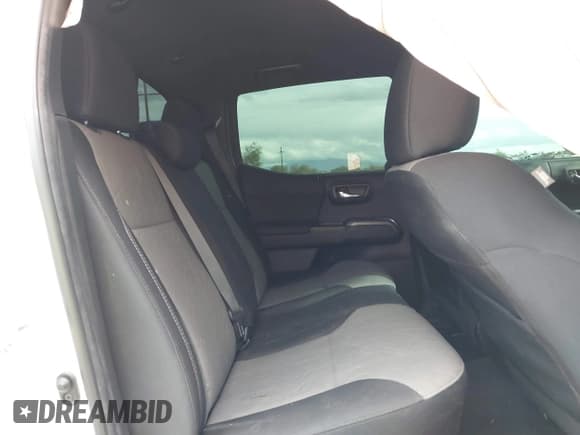 ✅ 2022 Toyota Tacoma TRD Sport • VIN: 3TYCZ5AN6NT099703 • Lot: 43741149. Listed on IAAI with 52,272 mi. Free auction sales archive from the USA and detailed vehicle history report at DreamBid. Image 8.