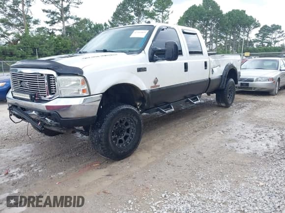 ✅ 2003 Ford F-350 XL • VIN: 1FTSW31P23ED37930 • Lot: 42341869. Listed on IAAI with 313,413 mi. Free auction sales archive from the USA and detailed vehicle history report at DreamBid. Image 2.