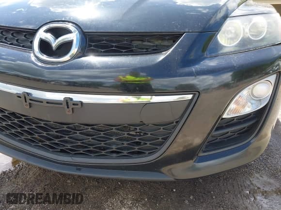 ✅ 2012 Mazda CX-7 i Touring • VIN: JM3ER2CM5C0415574 • Lot: 42263702. Wystawiony na IAAI z przebiegiem 293 566 mil. Bezpłatny archiwum sprzedaży aukcyjnych z USA i szczegółowy raport historii pojazdu na DreamBid. Zdjęcie 21.