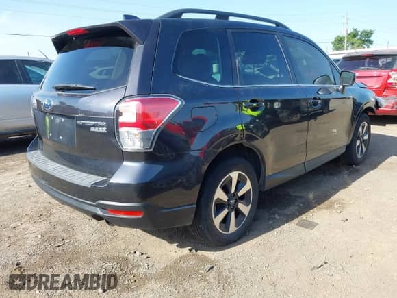 2017 Subaru Forester Limited with VIN JF2SJALC1HH513550, listed as a IAAI auction lot 42266191 with 98,351 mi miles and . Bid and sale history available at DreamBid. Image 4.