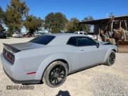 ✅ 2022 Dodge Challenger R/T Scat Pack Widebody • VIN: 2C3CDZFJ7NH205599 • Lot: 93121255. Listed on Copart with 10,112 mi. Free auction sales archive from the USA and detailed vehicle history report at DreamBid. Image 4.