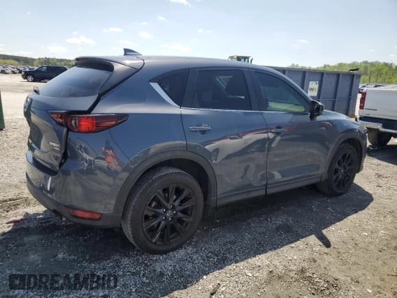 ✅ 2021 Mazda CX-5 Carbon Edition • VIN: JM3KFACYXM0366074 • Lot: 52032765. Wystawiony na Copart z przebiegiem 85 878 mil. Bezpłatny archiwum sprzedaży aukcyjnych z USA i szczegółowy raport historii pojazdu na DreamBid. Zdjęcie 3.