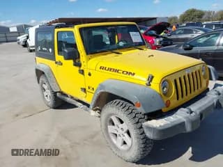 ✅ 2007 Jeep Wrangler X • VIN: 1J4FA24107L230159 • Lot: 43698240. Listed on IAAI with 141,541 mi. Free auction sales archive from the USA and detailed vehicle history report at DreamBid. Image 1.
