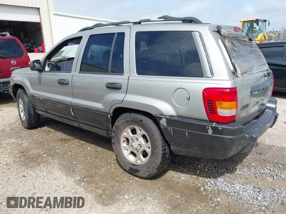 ✅ 2000 Jeep Grand Cherokee Laredo • VIN: 1J4G248S5YC299897 • Lot: 41944724. Listed on IAAI with Not provided. Free auction sales archive from the USA and detailed vehicle history report at DreamBid. Image 3.