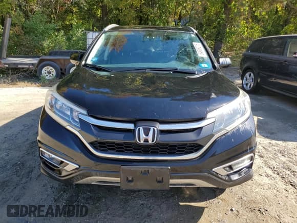✅ 2015 Honda CR-V EX-L • VIN: 2HKRM4H78FH667155 • Лот: 84909215. Опубликован ранее на Copart с пробегом 308 580 миль. Бесплатный доступ к архиву аукционных продаж из США и подробный отчёт об истории автомобиля на DreamBid. Изображение 5.