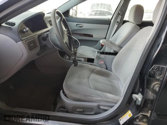 ✅ 2007 Buick LaCrosse CX • VIN: 2G4WC552571104504 • Lot: 89850595. Wystawiony na Copart z przebiegiem 132 197 mil. Bezpłatny archiwum sprzedaży aukcyjnych z USA i szczegółowy raport historii pojazdu na DreamBid. Zdjęcie 7.