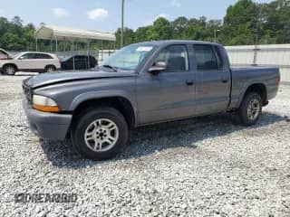 2003 Dodge Dakota Sport z VIN 1D7HL38X33S350007, wystawiony jako Copart lot #59471835 z przebiegiem 222 406 mil mil oraz Szkoda całkowita • Salvage title. Historia ofert i sprzedaży dostępna na DreamBid. Obrazek 1.