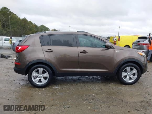 ✅ 2012 Kia Sportage LX • VIN: KNDPBCA25C7262134 • Lot: 43557412. Listed on IAAI with 121,604 mi. Free auction sales archive from the USA and detailed vehicle history report at DreamBid. Image 13.