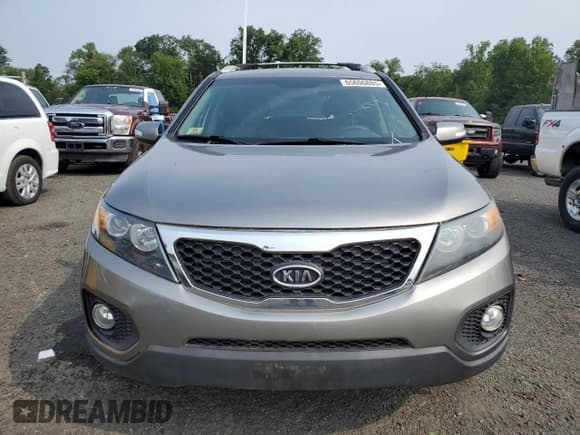 ✅ 2012 Kia Sorento LX • VIN: 5XYKTDA68CG299049 • Lot: 65606885. Listed on Copart with 132,232 mi. Free auction sales archive from the USA and detailed vehicle history report at DreamBid. Image 5.