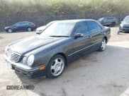 ✅ 2001 Mercedes-Benz E 320 • VIN: WDBJF70J51B232005 • Lot: 41912486. Listed on IAAI with 148,485 mi. Free auction sales archive from the USA and detailed vehicle history report at DreamBid. Image 2.