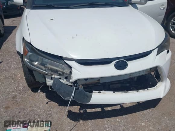 ✅ 2014 Scion tC • VIN: JTKJF5C74E3074397 • Лот: 42721852. Опубликован ранее на IAAI с пробегом 166 082 миль. Бесплатный доступ к архиву аукционных продаж из США и подробный отчёт об истории автомобиля на DreamBid. Изображение 6.