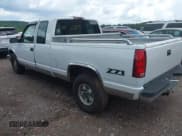 ✅ 1996 Chevrolet Silverado 1500 • VIN: 1GBEC19R4TE163895 • Lot: 42527439. Wystawiony na IAAI z przebiegiem 202 142 mil. Bezpłatny archiwum sprzedaży aukcyjnych z USA i szczegółowy raport historii pojazdu na DreamBid. Zdjęcie 3.