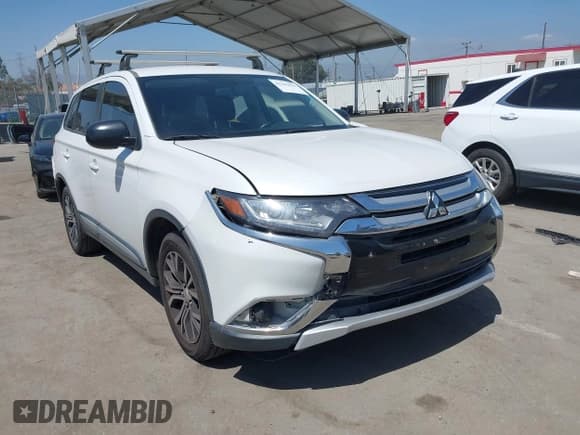 ✅ 2016 Mitsubishi Outlander ES • VIN: JA4AD2A30GZ051821 • Lot: 42283059. Listed on IAAI with 147,745 mi. Free auction sales archive from the USA and detailed vehicle history report at DreamBid. Image 1.